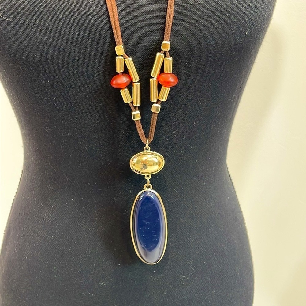 Chico’s leather long beaded necklace with gold and navy blue pendant